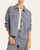 Front view of the Thread and Supply Faye Jacket in blue denim styled as a matching set