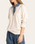 Side profile of the relaxed fit Thread and Supply Crest Pullover showing the banded hem and cuffs.