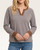 Front view of the Kansas split neck top featuring a notched v-neckline and dusty blue and camel stripes.