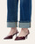 Close up detail of cuffed leg openings on Bayeas high rise jeans