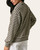 Back and side view of the Finley olive and cream striped knit top showing the soft textured fabric and banded hem.