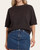 Woman wearing the Fall-ready Lyla dark chocolate crewneck sweater with drop shoulders.