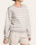 Front view of model wearing the taupe and ivory striped Thread and Supply Preston sweater.