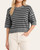 Front view of Casey dark grey short sleeve striped sweater styled with white pants