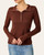 Woman wearing a brick and navy striped high neck henley top with thumb hole sleeves.