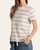 Side profile of a model wearing the short sleeve striped Asher Tee casually styled with denim for autumn.