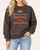 Front view of the Fall Pumpkin Spice Graphic Sweatshirt in washed chocolate brown featuring a pumpkin graphic and text.