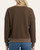 Back view of a women's dark chocolate waffle-knit thermal pullover with a banded hem and relaxed fit.