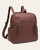 Angled front view of the Alora Convertible Backpack - Chocolate, showing two vertical front zippers and a side pocket.