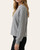 Side view of the ash grey Blanket Stitch Collared Knit Top showing the straight cut bodice.