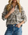 Front view of the Kasey Plaid Button Up in taupe, black, and tan.