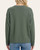 Back view of model wearing the light olive Carmine Crewneck Sweater showing the relaxed fit and ribbed texture.   