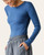 Angled front view of the Micro Ribbed Long Sleeve Top - Ocean on a model, showing the crew neckline and fitted silhouette.