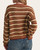 Grace Striped Cardigan - Brown/Maroon modeled from the back, showing cream stripes, maroon accents and ribbed hem and cuffs.