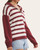 Angled side view of the Evergreen Half Zip Sweater - Dark Wine, showing the open collar, dropped shoulder and ribbed hem.