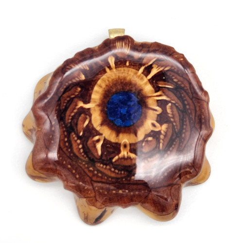 Check out this Crushed Lapis Pinecone Pendant. Order online from Tree Huggers Co-op in La Crosse, Wisconsin.