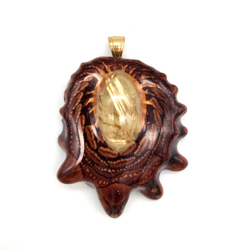 Buy a Glowing Rutilated Quartz Pinecone Pendant Online from Tree Huggers Co-op