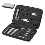 A tool set in a black carry case featuring pliers, various screwdrivers, and a selection of attachments. A tool set in a black carry case featuring pliers, various screwdrivers, and a selection of attachments.