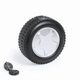 A black and silver keyring shaped like a tire, accompanied by a circular tool set within a compact case. A black and silver keyring shaped like a tire, accompanied by a circular tool set within a compact case.