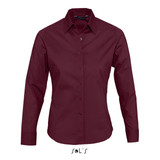 A long sleeve button-up shirt in burgundy, featuring a collar and a logo at the bottom. A long sleeve button-up shirt in burgundy, featuring a collar and a logo at the bottom.