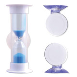 A water-saving shower timer in a transparent casing with blue sand, featuring a white base and top. A water-saving shower timer in a transparent casing with blue sand, featuring a white base and top.