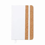 A notebook with a white PU cover and a cork panel, featuring an elastic band for closure.