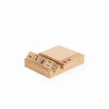 A wooden notepad featuring a perpetual calendar with numbered blocks and a natural finish. A wooden notepad featuring a perpetual calendar with numbered blocks and a natural finish.