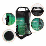A full-colour dry bag in green and black with water droplets, featuring a handle and adjustable strap.