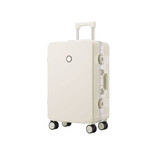 A ribbed ABS suitcase in cream colour, featuring a retractable handle and roller wheels. It has a circular logo on the front.