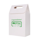 A white die cut handle bag with a green logo and text, featuring a top handle for easy carrying.