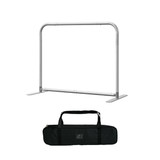 A silver sidewalk cafe barrier with a black carry bag, designed for exhibitions and events signage.