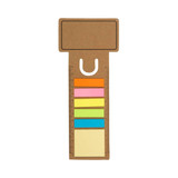 A business card bookmark with a ruler design, featuring multicoloured noteflags and a brown cardboard texture.