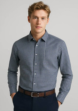 A button-up shirt in navy blue with a checked pattern, featuring long sleeves and a collar. It has a logo.