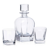 A drink bottle and two matching glasses in clear glass, featuring a classic design with a stopper. A drink bottle and two matching glasses in clear glass, featuring a classic design with a stopper.