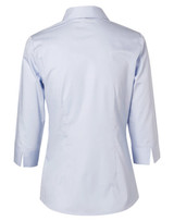 A light blue women's button-up shirt with 3/4 sleeves and a standard collar, featuring a back yoke detail. A light blue women's button-up shirt with 3/4 sleeves and a standard collar, featuring a back yoke detail.