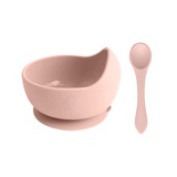 A pink silicone kids suction bowl with a matching spoon and a logo. The bowl features a built-in suction base. A pink silicone kids suction bowl with a matching spoon and a logo. The bowl features a built-in suction base.