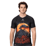 A black sublimated tee featuring a vibrant volcano graphic in red and orange hues, with a logo on the chest.