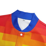 A vibrant unisex track jacket featuring a multicoloured design in red, orange, yellow, and blue, with a branding logo.