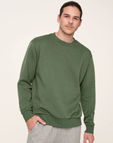 A unisex crew neck sweater in a green shade, featuring a relaxed fit and a logo on the front.