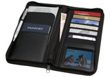 A black Meridian Travel Wallet containing a passport, cards, cash, and a pen, with a zippered closure.