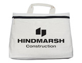 A cream conference bag with a top zip closure and a handle, featuring a logo on the front.
