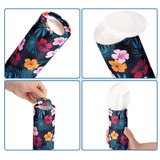 A cylindrical tissue dispenser with a floral pattern in dark blue, featuring bright pink and yellow flowers. It has a removable lid.