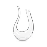 A U-shaped, clear glass wine decanter with elegant curves and a single spout, featuring a logo.