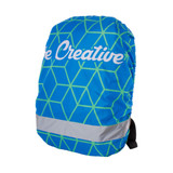 A blue and green geometric-patterned reflective backpack cover with a logo and a grey reflective strip.