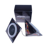 Pyramid foldable speakers in black with a colourful design, featuring a logo and a compact box for storage.