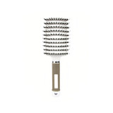 A detangler bristle hairbrush with a white head and a textured tan handle, featuring a branding logo.