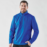 A blue men's 1/4 zip anorak jacket, featuring a collar and side pockets. The jacket has a logo.