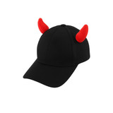 A black baseball cap featuring red, plush devil horns on the top. The cap has a logo on the front.