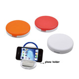 Three round mobile stands in orange, red, and white, with an attached phone holder. Features a branding logo.