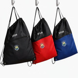 Drawstring bags in black, red, and blue with zip pockets and logos. Each features the year "2026".